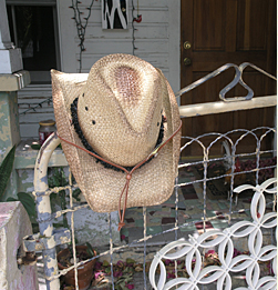 Photography can be set up in a studio or on location. This photo of a straw hat was taken in Key West Florida.